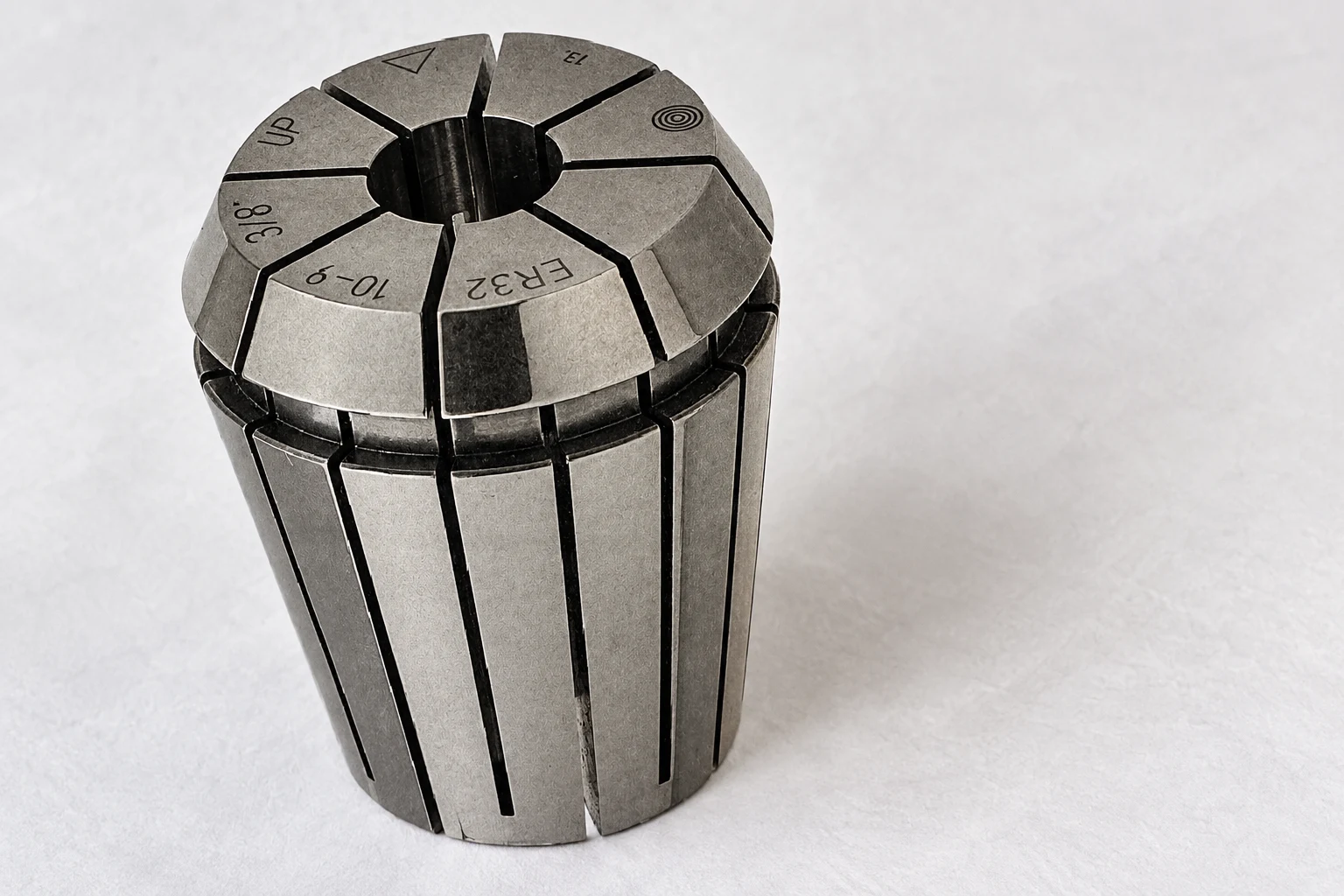 ER32 collet with original slots and markings; photo-based editorial edit