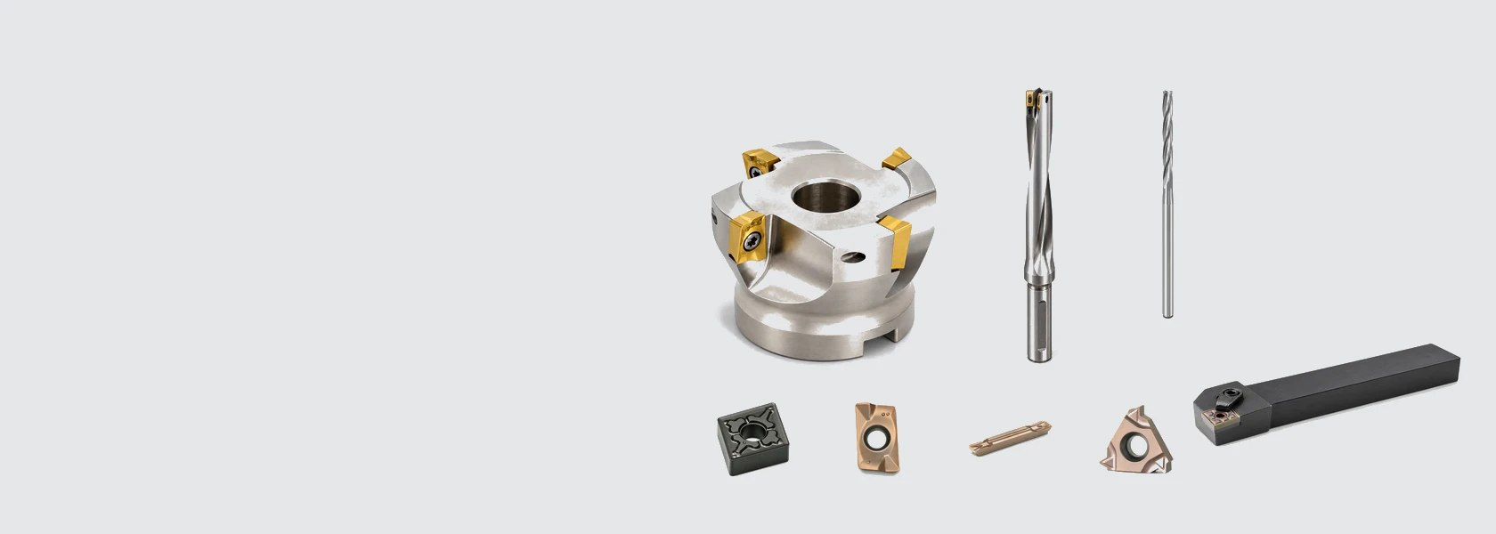 CNC cutting tools including solid carbide end mills, an indexable milling cutter, U-drill, turning tool holder and carbide inserts